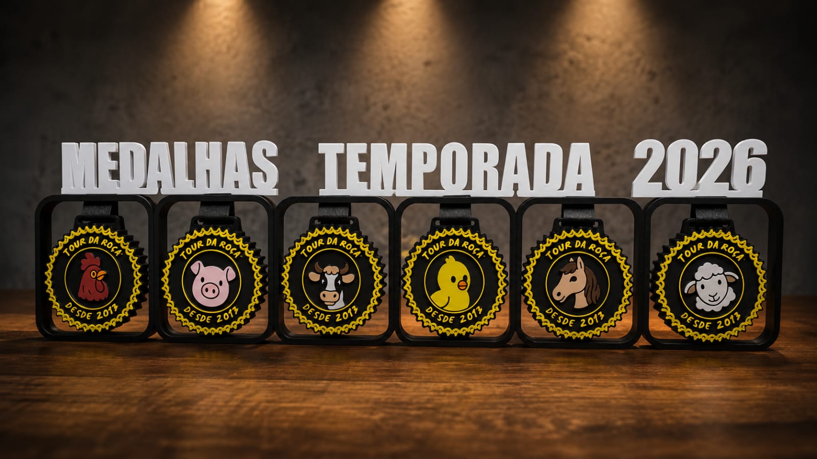 Coleção de medalhas e plaquinhas da Fazendinha Tour da Roça 2026